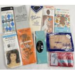10 assorted vintage pairs of seam free nylon stockings in various colours, in original packaging. To