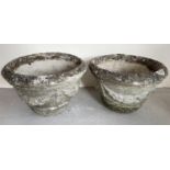 A pair of large vintage concrete garden planters, circular shape with floral swag detail in