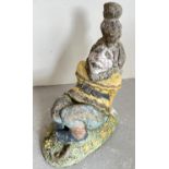 A vintage concrete garden gnome with a squirrel on his head. With painted detail. Approx. 46cm