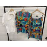 A ladies matching jersey skirt and short sleeve top by Madge, in bright colours (size 2) together