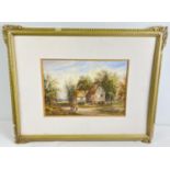 A framed and mounted water colour of figures, cows and a rural cottage. Indistinct signature to