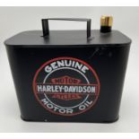 A small metal Harley Davidson oil can, painted black with brass screw top. Approx. 19cm tall.