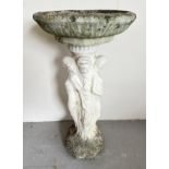 A decorative concrete 2 sectional garden bird bath with pedestal base modelled with 3 women of