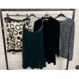 4 items of ladies clothing. A green velvet skirt, a black velvet jacket with mandarin collar, a