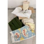 A box of assorted vintage textiles. To include vintage striped cotton and linen lining materials,