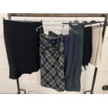 6 items of ladies clothing to include a black skirt, beige trousers and green & blue dogtooth