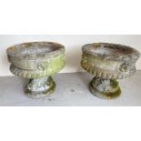 A pair of vintage pedestal based 2 sectional garden planters with floral detail. Each approx. 35cm