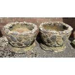 A large & heavy pair of staone & concrete garden planters with stepped design base. Approx. 34cm
