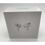 A boxed & sealed set of Apple Airpods Pro with MagSafe charging case. Model A2083 A2084 A2190.