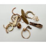 A small quantity of scrap gold to include earrings. Marked or tests as 9ct. Total weight approx. 7.