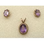 A pair of gold & amethyst set stud earrings together with an oval amethyst set 9ct gold pendant.