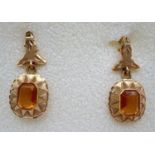 A pair of vintage 18ct gold and citrine lever backed drop earrings. Floral design to posts, square