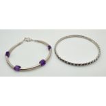 2 silver bracelets. A vintage patterned bangle hallmarked Birmingham 1938 and a modern bracelet with