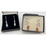 3 pairs of drop style silver earrings. An Art Deco style pair set with blue mother of pearl and