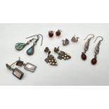 6 pairs of silver and white metal stud and drop style earrings. To include marcasite and faux