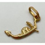 An 18ct gold charm/pendant in the shape of a gondola. Gold marks to bale. Approx. 2.5cm long (