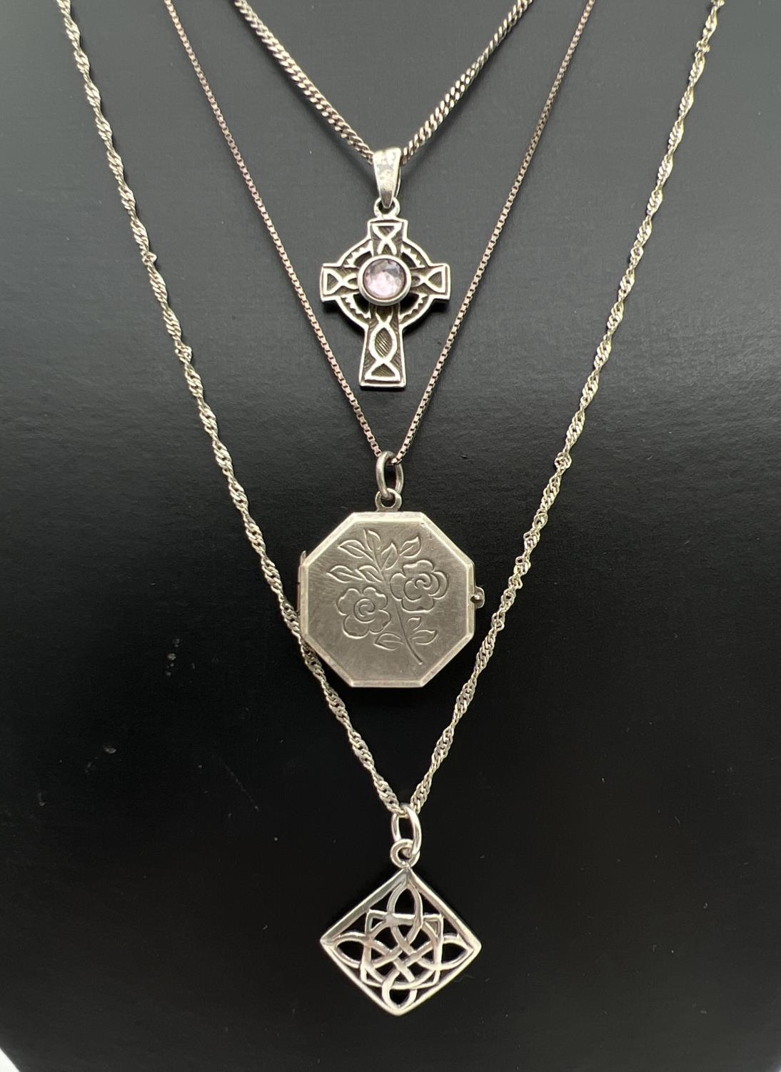 3 silver and white metal pendant necklaces. An 18" fine box chain with vintage white metal octagonal