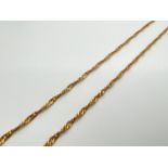 A 28 inch 18ct gold Singapore style chain necklace with Spring ring clasp. Worn marks to clasp.