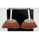 A pair of contemporary style drop silver and resin earrings. Semi circle shaped brown resin pieces