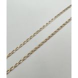 A 9ct gold 18" curb chain with spring ring clasp (clasp needs attention). Gold marks to fixings.