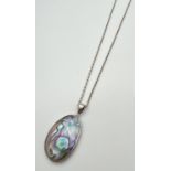 An oval shaped Abalone shell pendant set in silver, on a 20" belcher chain with spring ring clasp.