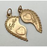 A yellow metal double "Together Forever" split heart pendant. Hanging bales to both pieces. Unmarked