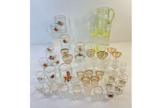 A box of assorted mid century glass ware to include transfer printed glasses and gilt striped