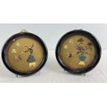 A pair of vintage Chinese circular frames with 3 dimensional floral scenes made of natural stone