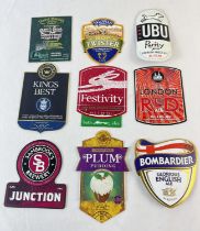 9 beer pump clips from various breweries. Comprising: Pure UBU , Bombardier, Lees Plum Pudding,