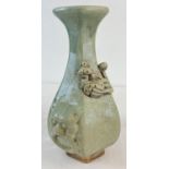 A Chinese jade glazed hexagonal shaped vase with crackle glaze and applied peacock bird detail.