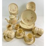 A collection of Denby stoneware dinner and tea ware in neutral tones with floral design. Comprising: