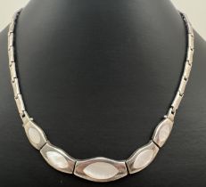 A modern 16 inch silver and Mother Of Pearl solid flat link fixed pendant necklace with clip