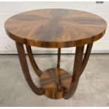 An Art Deco design circular shaped veneer occasional table with polished finish. Scuffs to top and