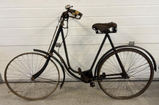 An early 20th century Imperial Rover of Coventry bicycle with leather Middlemore sprung saddle seat.