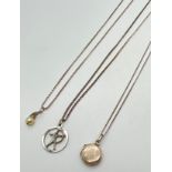 3 silver & white metal pendant necklaces. A 925 silver small circular locket on an 18" curb chain