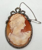 A large vintage 'Habille' cameo brooch of a fine lady, in a marcasite set silver mount. Complete