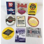 9 beer pump clips from various breweries. Comprising: Milestone Colonial Pale Ale, Hopback Summer