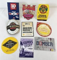 9 beer pump clips from various breweries. Comprising: Milestone Colonial Pale Ale, Hopback Summer