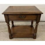 A vintage dark oak Simon Simpson, Norwich (Mark Chambers) side/occasional table with central