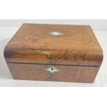 An antique wooden writing box (interior slope and compartments missing) with brass lock and