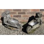 2 weathered garden ornaments/planters modelled as animals pushing wheelbarrows. A hedgehog and a
