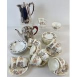 A Wedgwood 12 setting tea set in 'Lichfield' floral design pattern, together with a vintage silver