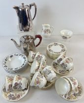 A Wedgwood 12 setting tea set in 'Lichfield' floral design pattern, together with a vintage silver