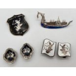 4 items of Siam silver jewellery. A dragon boat brooch with blue enamel detail; and a brooch, a pair