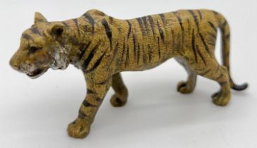 After Franz Bergmann - a small cold painted bronze figurine of a tiger. Approx. 5.5cm tall x 12cm