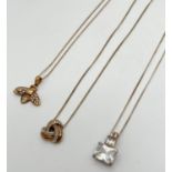 3 silver and silver gilt necklaces. A modern square shaped pendant set with clear stones, on a