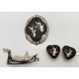 3 items of Siam silver jewellery. A brooch and pair of clip on earrings with Thai dancer