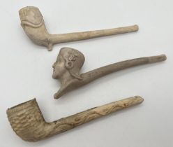 3 antique white clay pipes. All with carved detail. To include a carved head of a woman (a/f) and