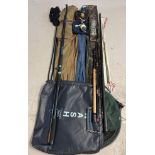 A collection of fishing equipment to include a Fladen Powerstick 360 12ft fishing rod with canvas