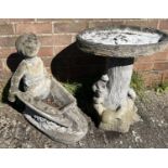 A large modern garden bird bath modelled as squirrels on a tree trunk together with a garden planter